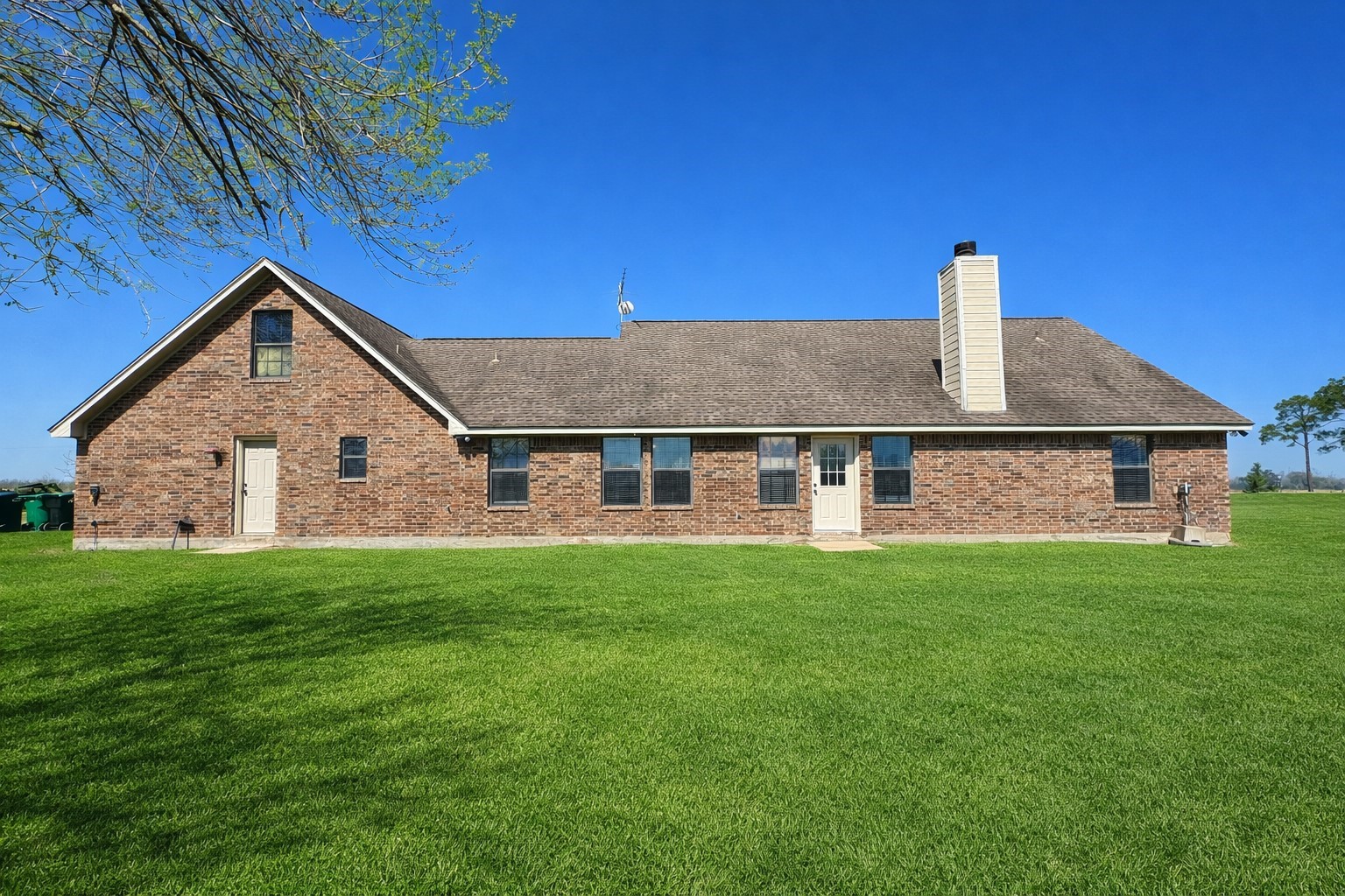 15903 County Road 621 Angleton, TX 77515 - Photo 28 of 33 a front view of a house with a yard
