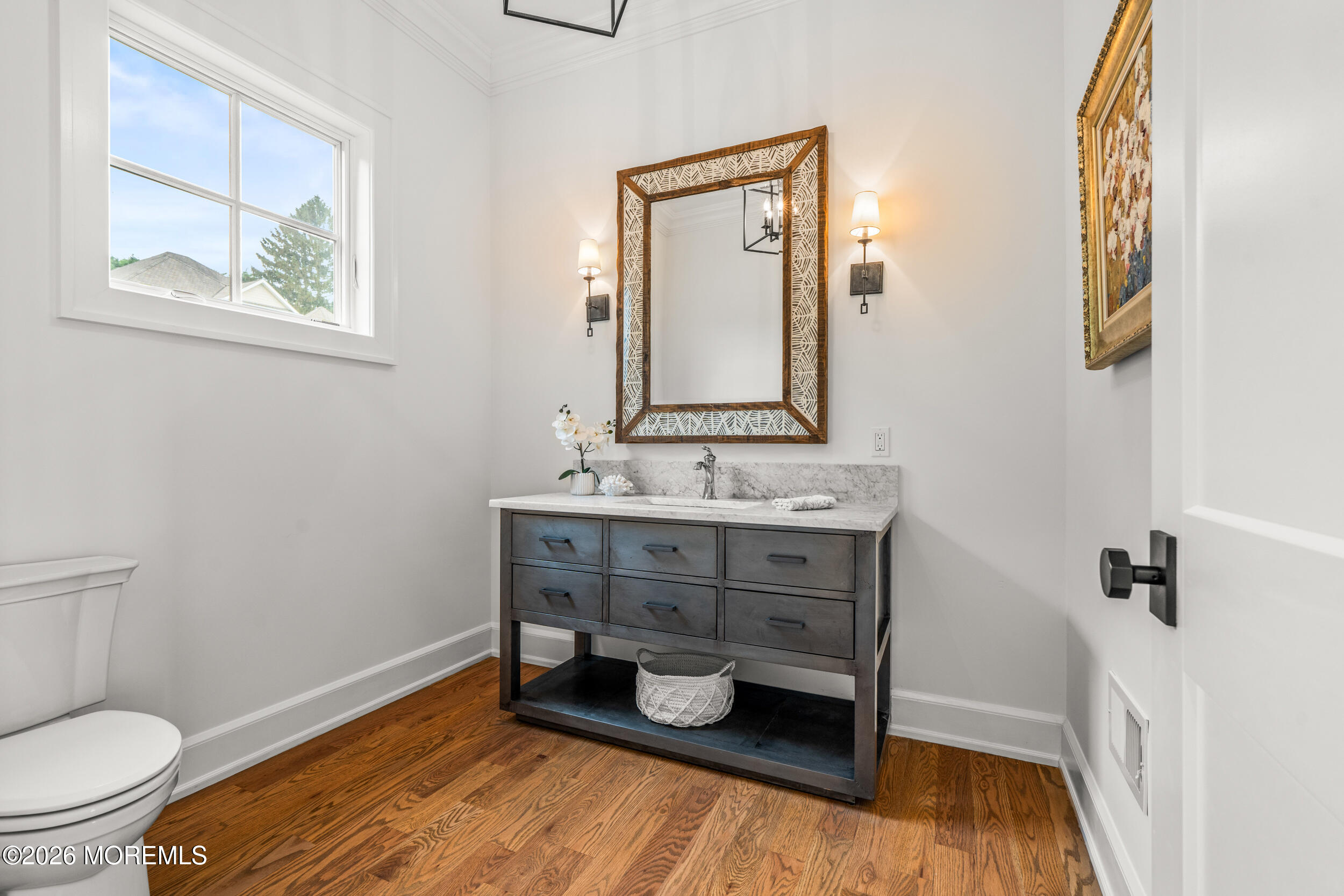 11 Beacon Hill Road Atlantic Highlands, NJ 07716 - Photo 28 of 74 a bathroom with a sink a toilet and mirror
