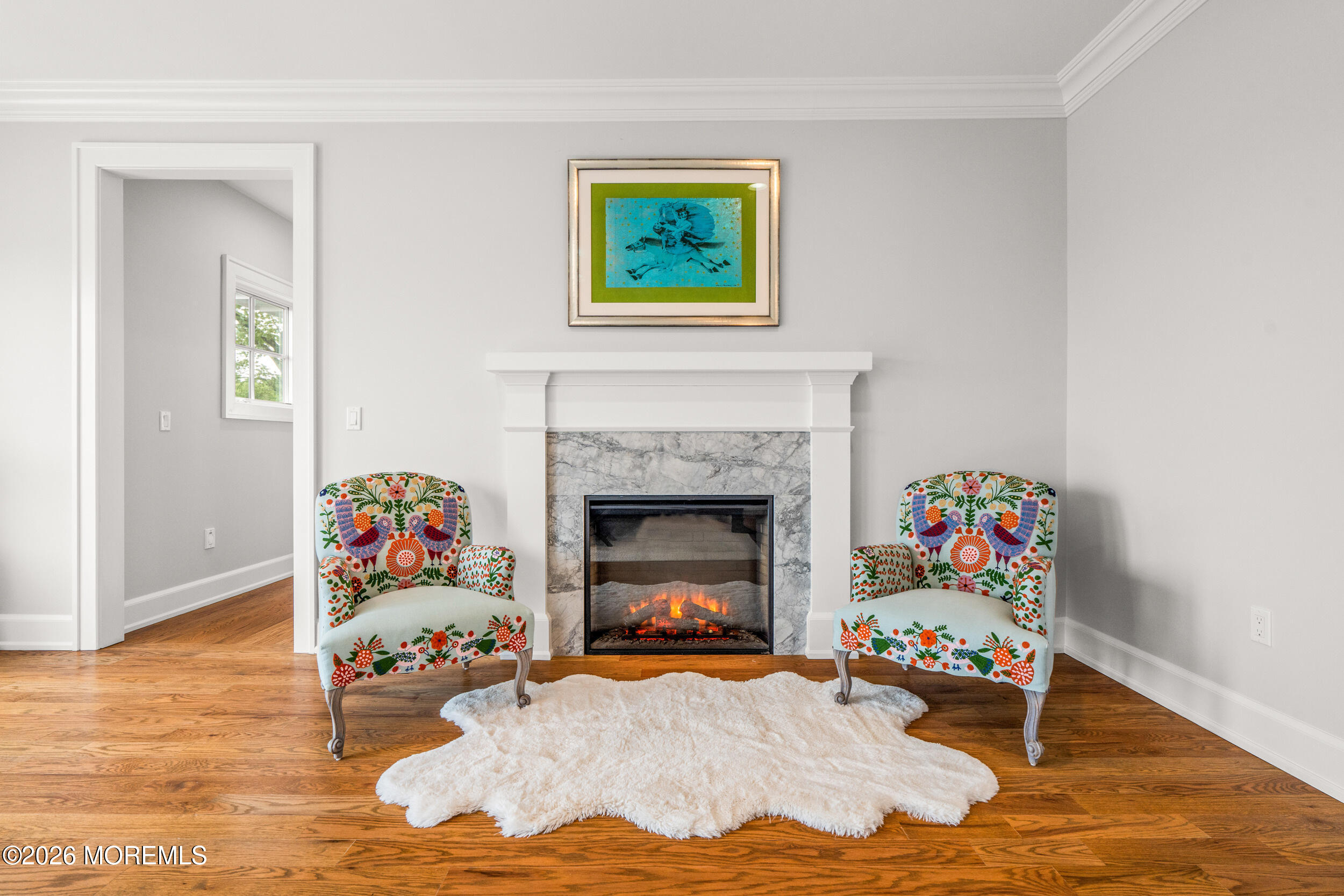 11 Beacon Hill Road Atlantic Highlands, NJ 07716 - Photo 32 of 74 a living room with furniture and a fireplace