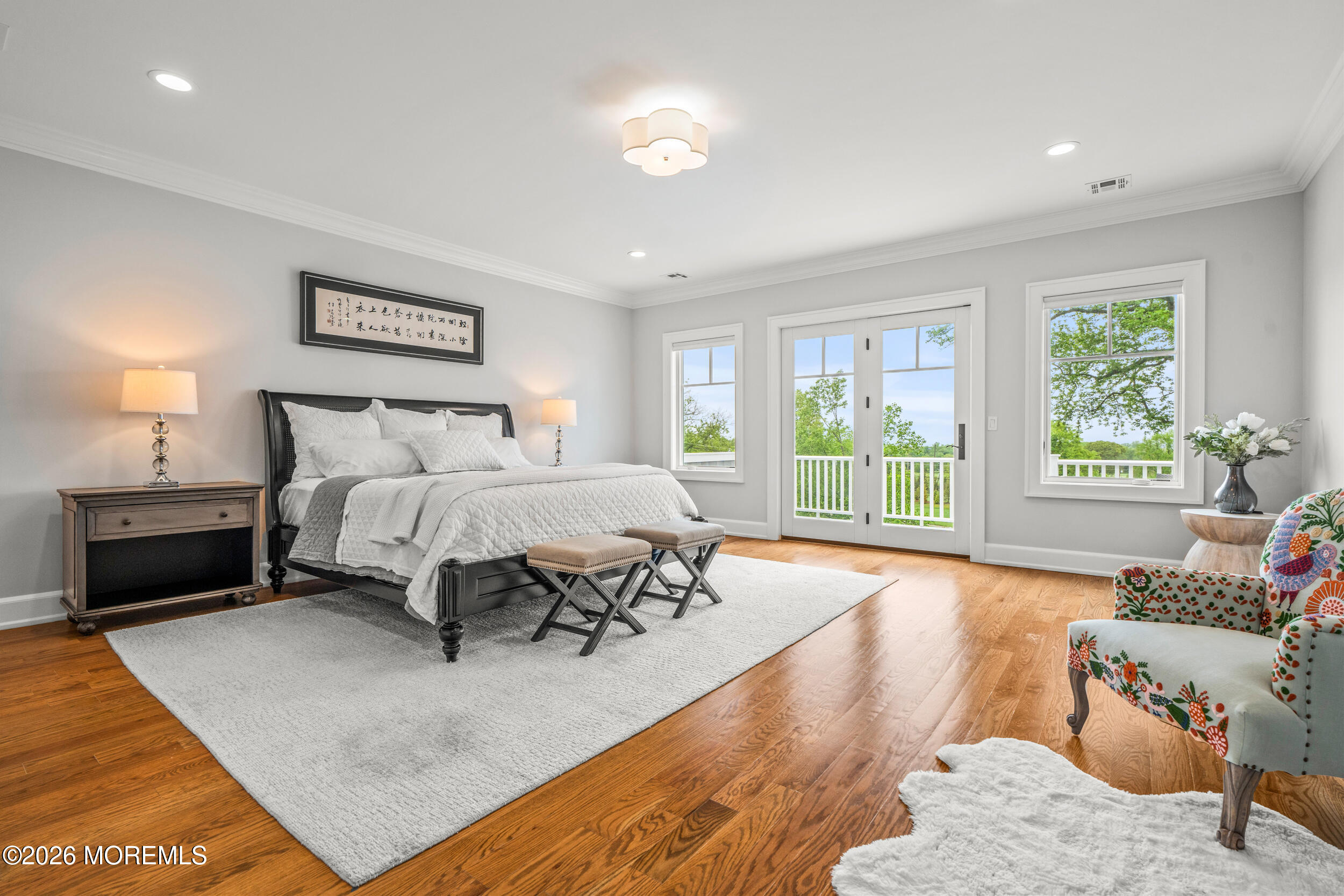 11 Beacon Hill Road Atlantic Highlands, NJ 07716 - Photo 33 of 74 a spacious bedroom with a bed and a couch