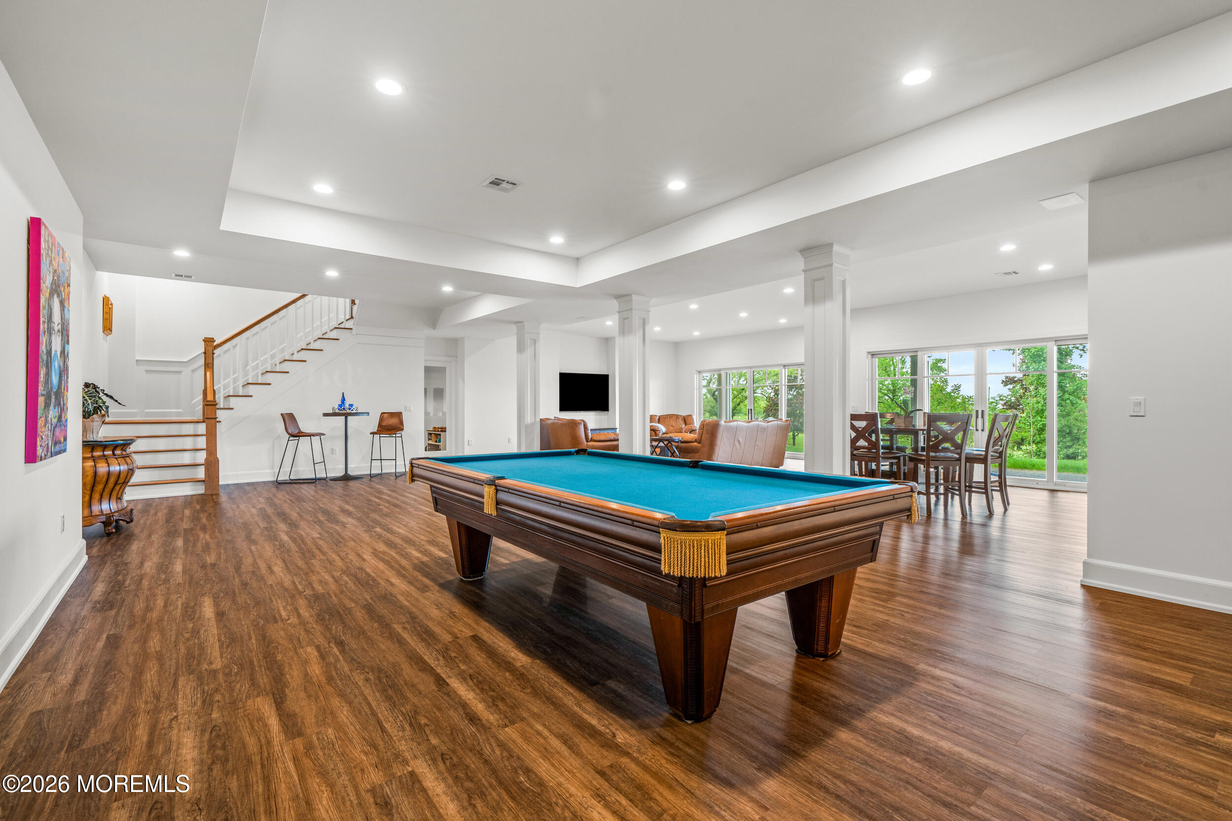 11 Beacon Hill Road Atlantic Highlands, NJ 07716 - Photo 54 of 74 a room with wooden floors pool table and windows