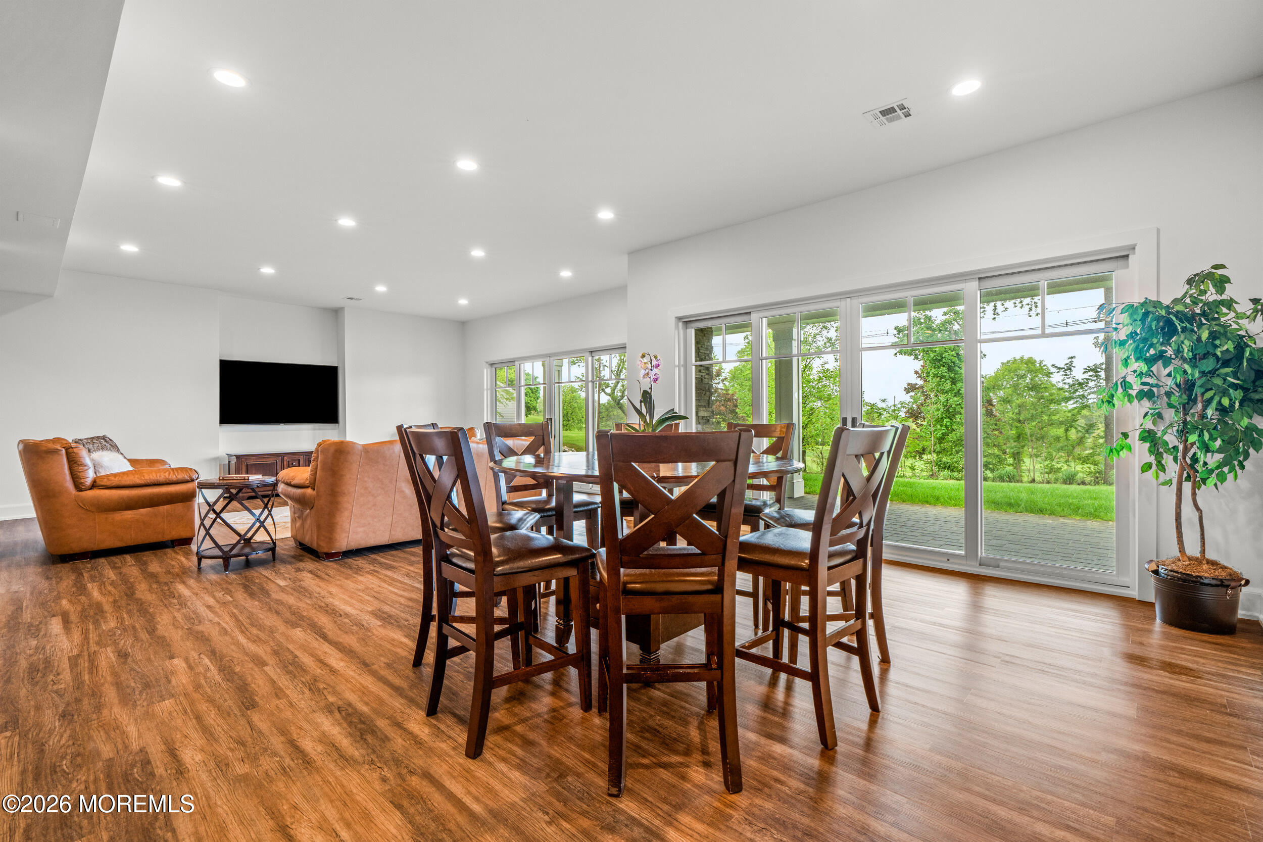 11 Beacon Hill Road Atlantic Highlands, NJ 07716 - Photo 55 of 74 a view of a dining room with furniture window and wooden floor