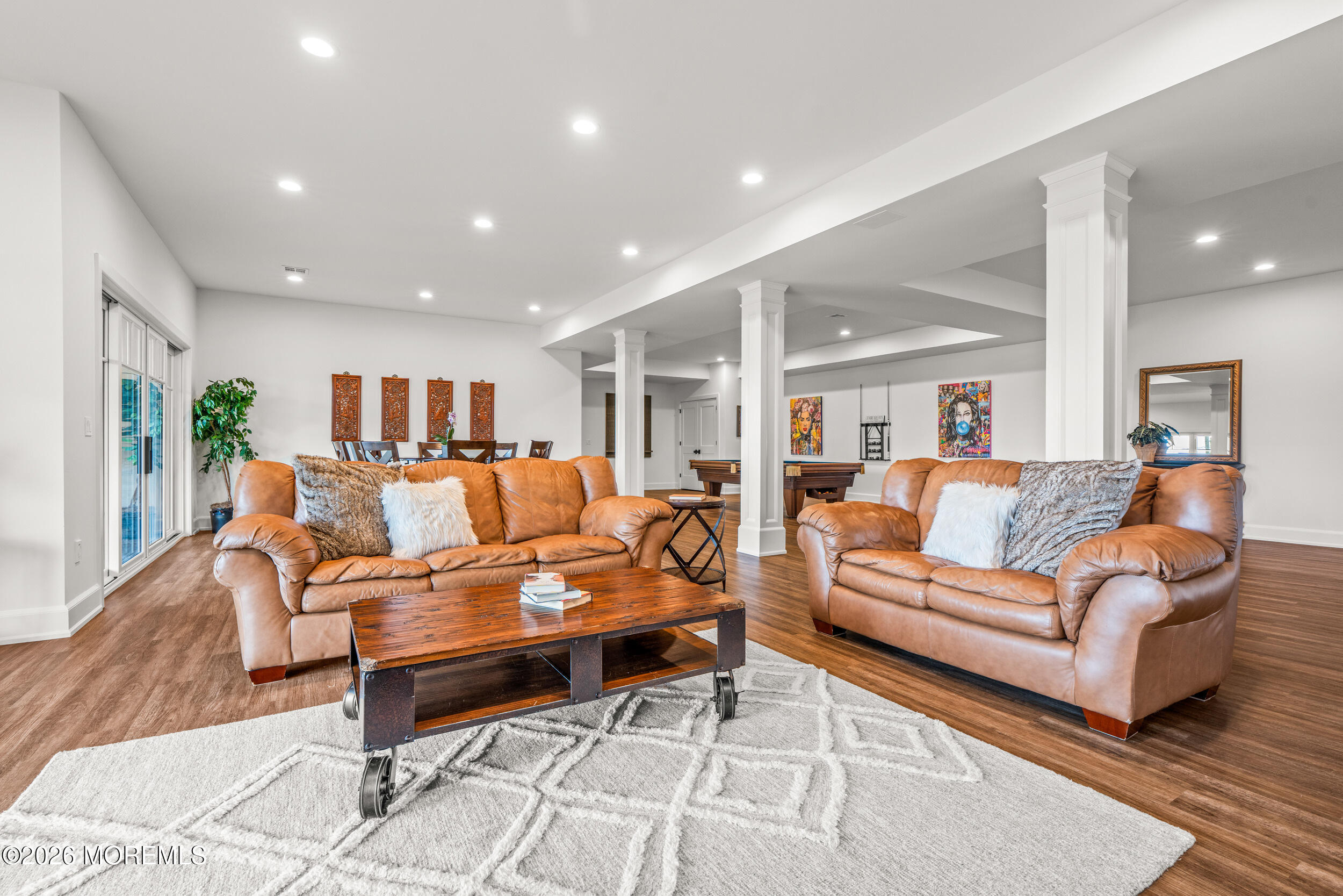 11 Beacon Hill Road Atlantic Highlands, NJ 07716 - Photo 57 of 74 a living room with furniture and a wooden floor