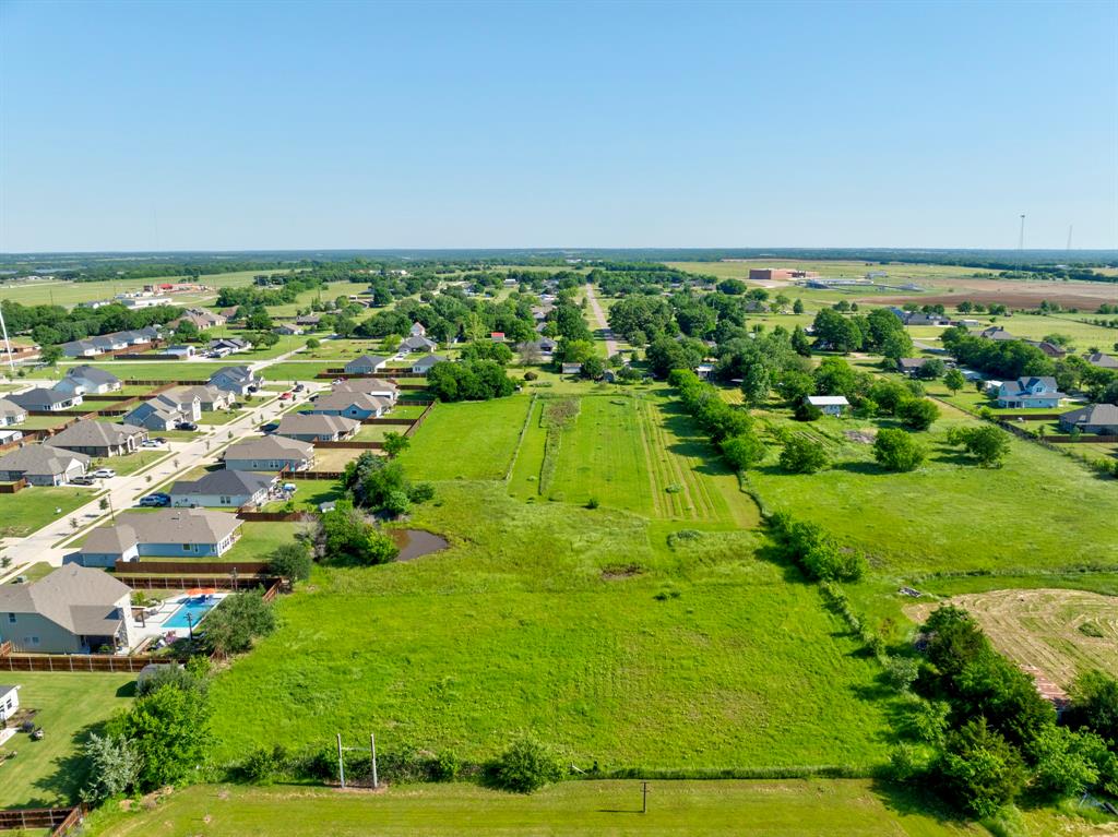 305 Swaha Road Tioga, TX 76271 - Photo 8 of 15 an aerial view of residential houses with outdoor space and trees