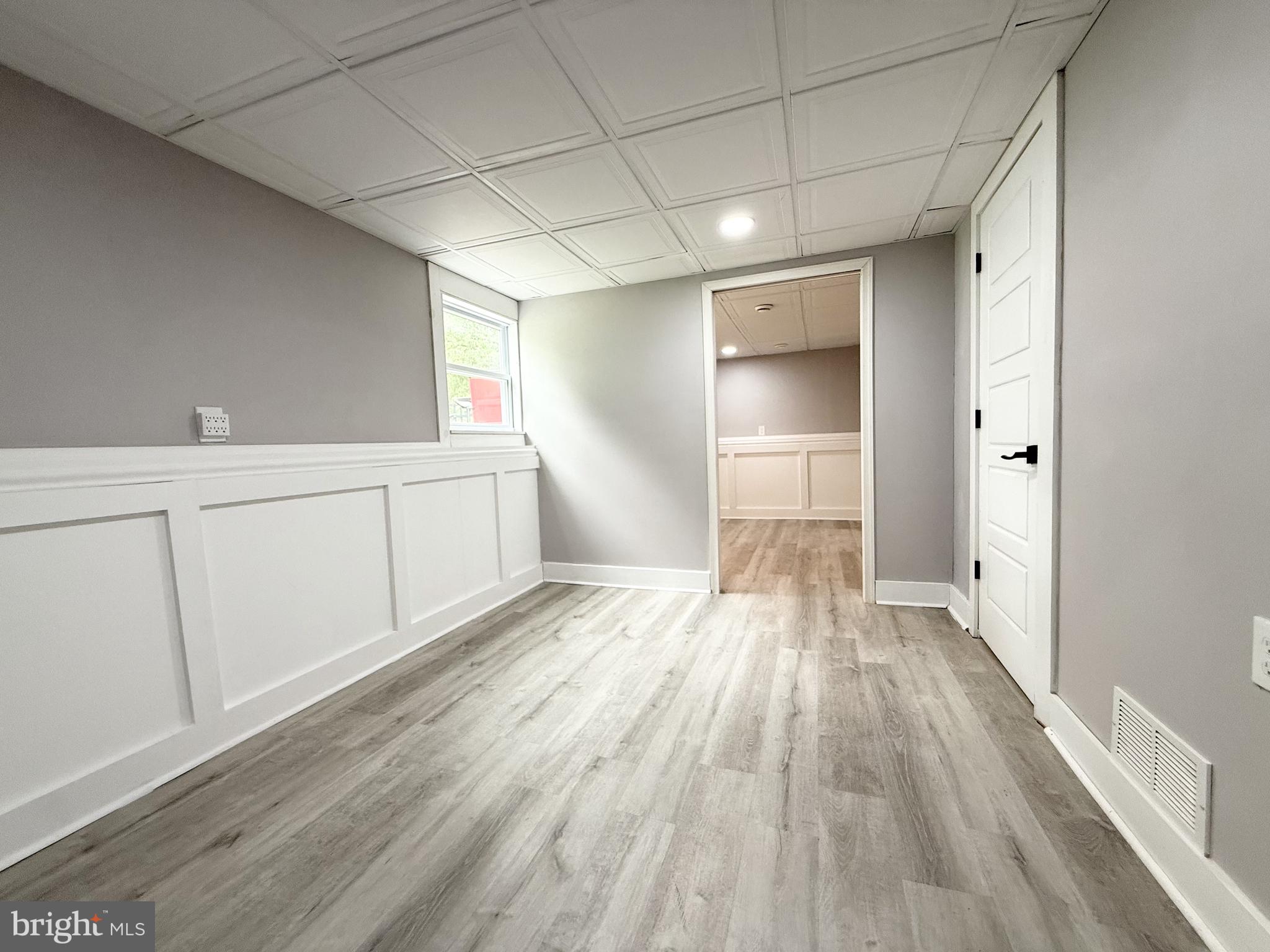 20 Chestnut Drive Elkton, MD 21921 - Photo 14 of 68 a view of an empty room with wooden floor and a window