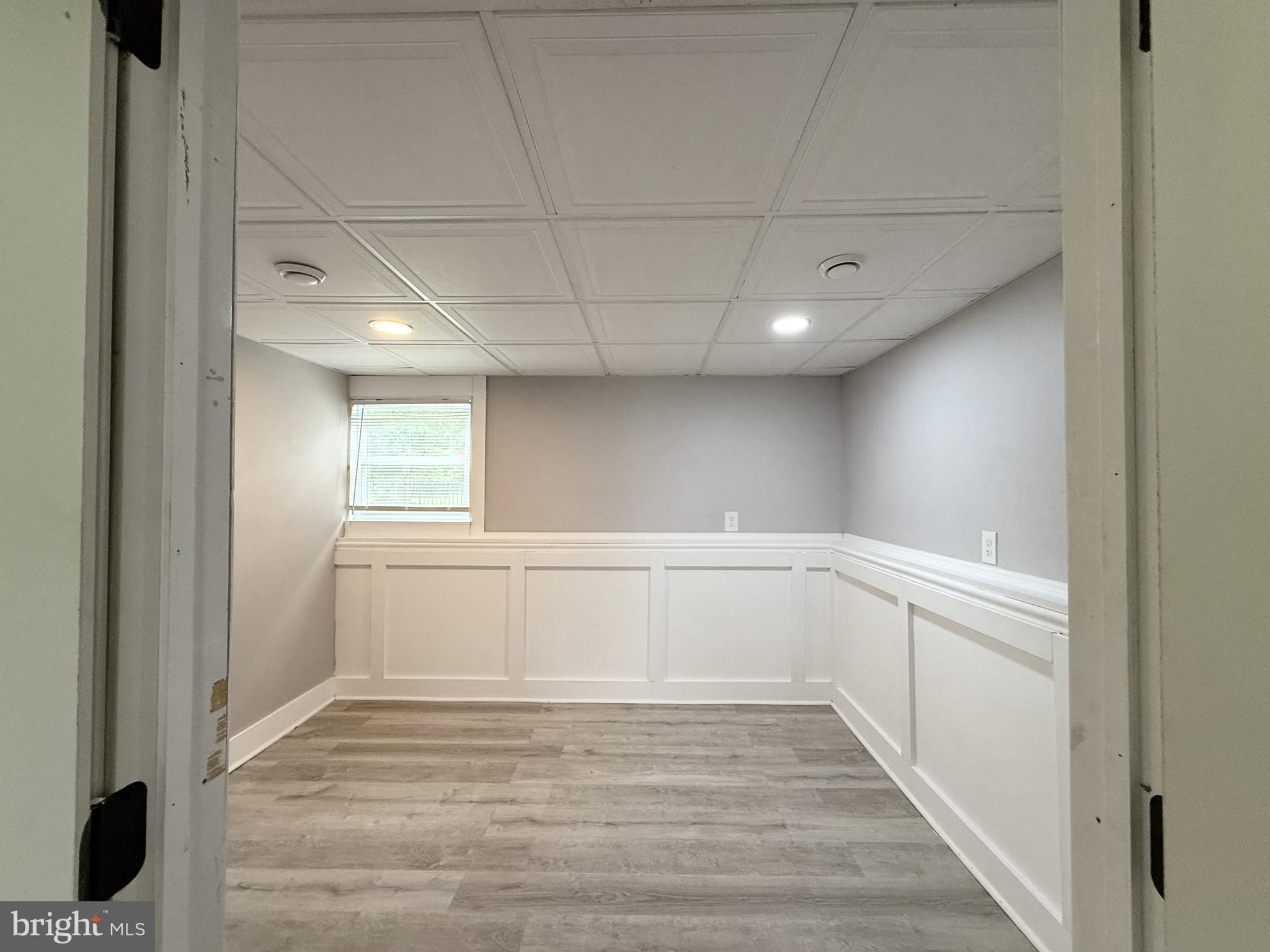 20 Chestnut Drive Elkton, MD 21921 - Photo 21 of 68 a view of an empty room with wooden floor and a window