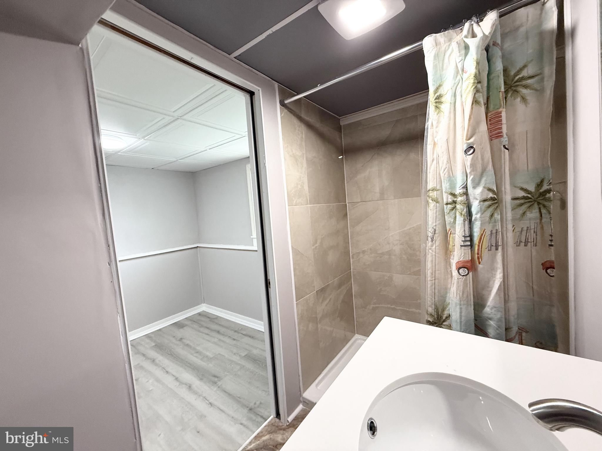 20 Chestnut Drive Elkton, MD 21921 - Photo 28 of 68 a bathroom with a sink and shower