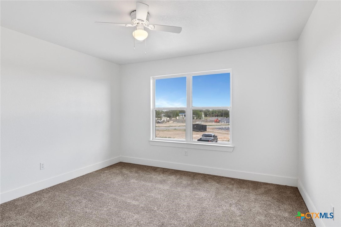 1920 Royal Loop Belton, TX 76513 - Photo 11 of 15 an empty room with a window