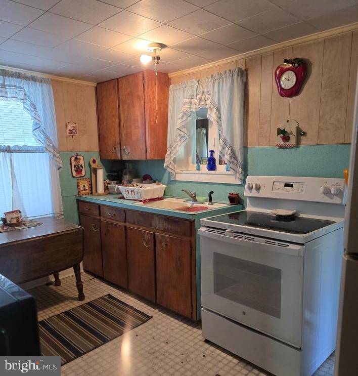 18927 Spring Run Road Dry Run, PA 17220 - Photo 10 of 16 a kitchen with a stove a sink and a microwave