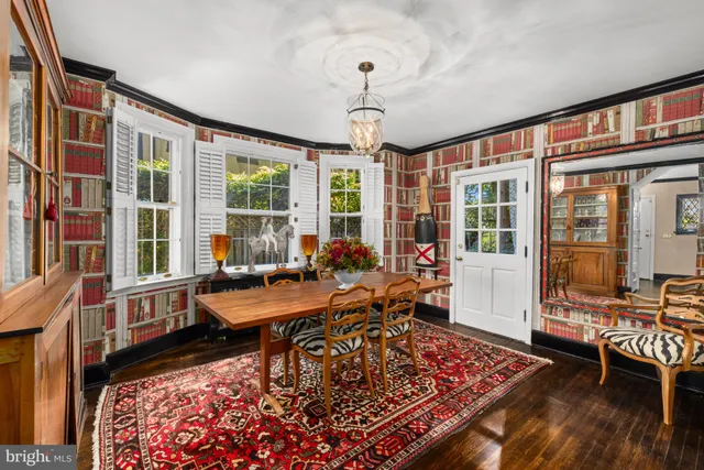 a outdoor space with lots of furniture and a rug