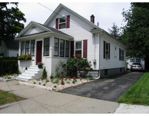 48 David Street Springfield, MA 01104 - Photo 1 of 21 a front view of a house with a yard and garage