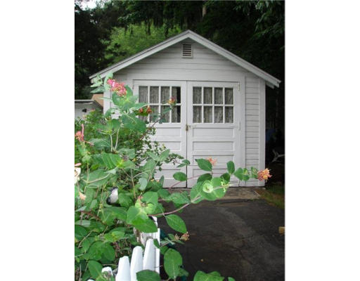 48 David Street Springfield, MA 01104 - Photo 19 of 21 a view of a house with a yard and plants