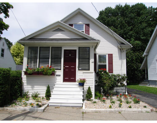 48 David Street Springfield, MA 01104 - Photo 2 of 21 a front view of a house with garden