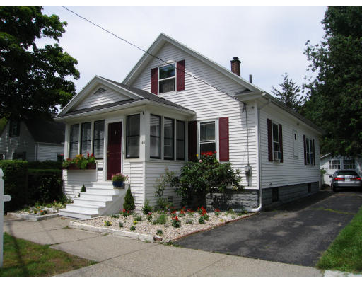48 David Street Springfield, MA 01104 - Photo 21 of 21 a front view of a house with yard and parking
