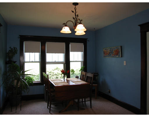 48 David Street Springfield, MA 01104 - Photo 9 of 21 a view of a dining room with furniture window and outside view