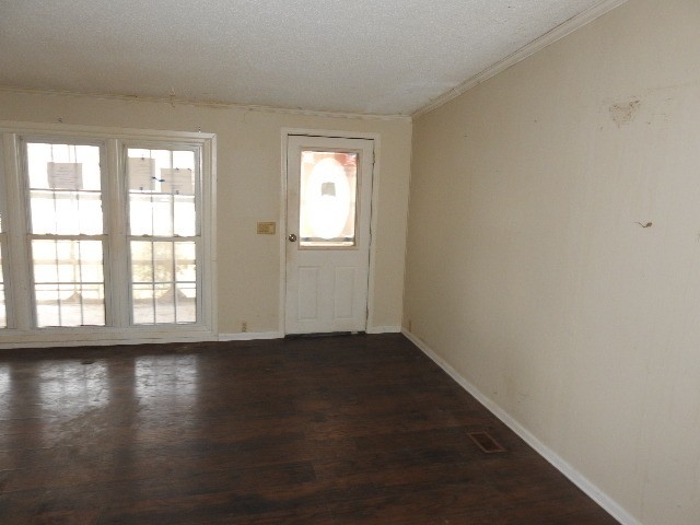 575 Templow Road Bethpage, TN 37022 - Photo 7 of 15 a view of an empty room with wooden floor and a window
