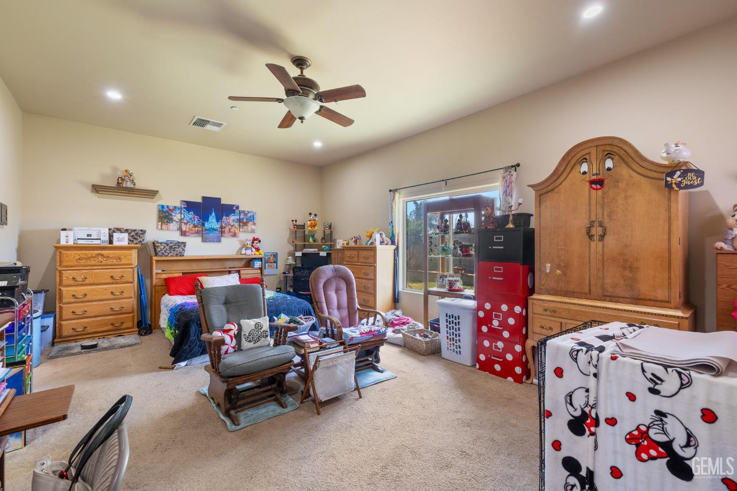 Undisclosed Address Bakersfield, CA 93314 - Photo 18 of 45 a living room with furniture and a flat screen tv