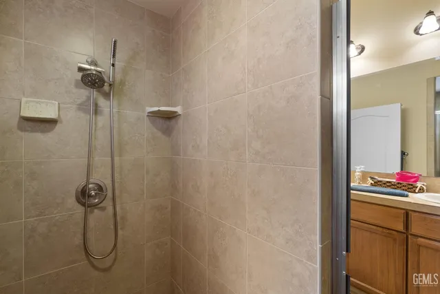a bathroom with a granite shower
