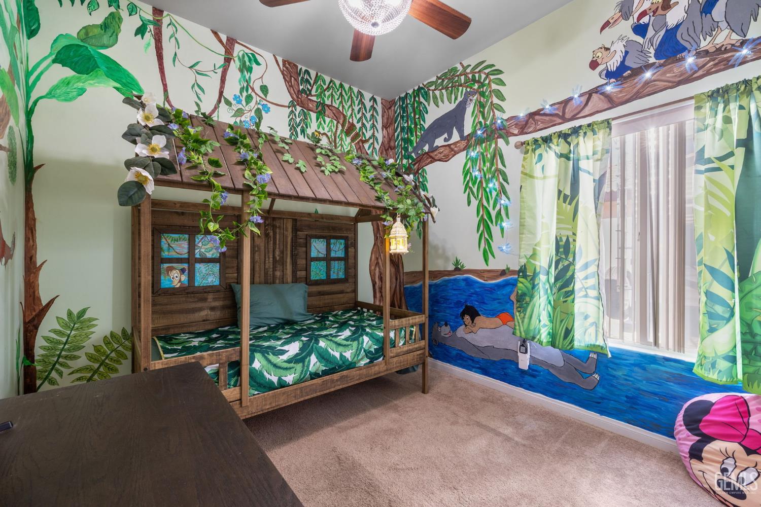 Undisclosed Address Bakersfield, CA 93314 - Photo 24 of 45 a living room filled with furniture and a chandelier
