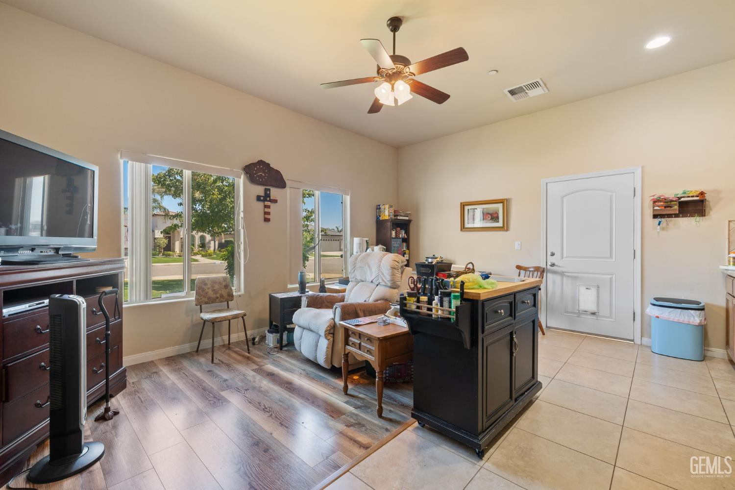 Undisclosed Address Bakersfield, CA 93314 - Photo 32 of 45 a living room with furniture and a fireplace