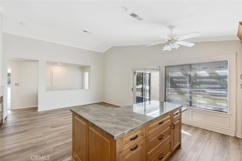 27619 Ron Ridge Drive Saugus, CA 91350 - Photo 15 of 37 a bathroom with a granite countertop sink a light fixture and a mirror