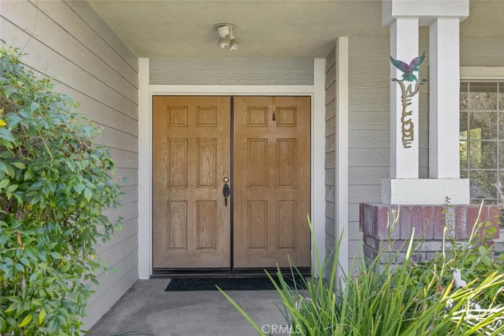 27619 Ron Ridge Drive Saugus, CA 91350 - Photo 3 of 37 a view of a door and chair in the room