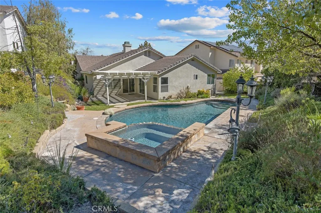 27619 Ron Ridge Drive Saugus, CA 91350 - Photo 32 of 37 a view of a house with garden