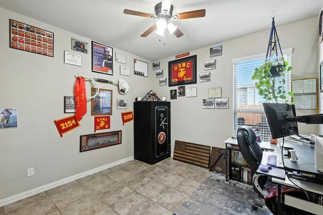 a view of a workspace with furniture and toys