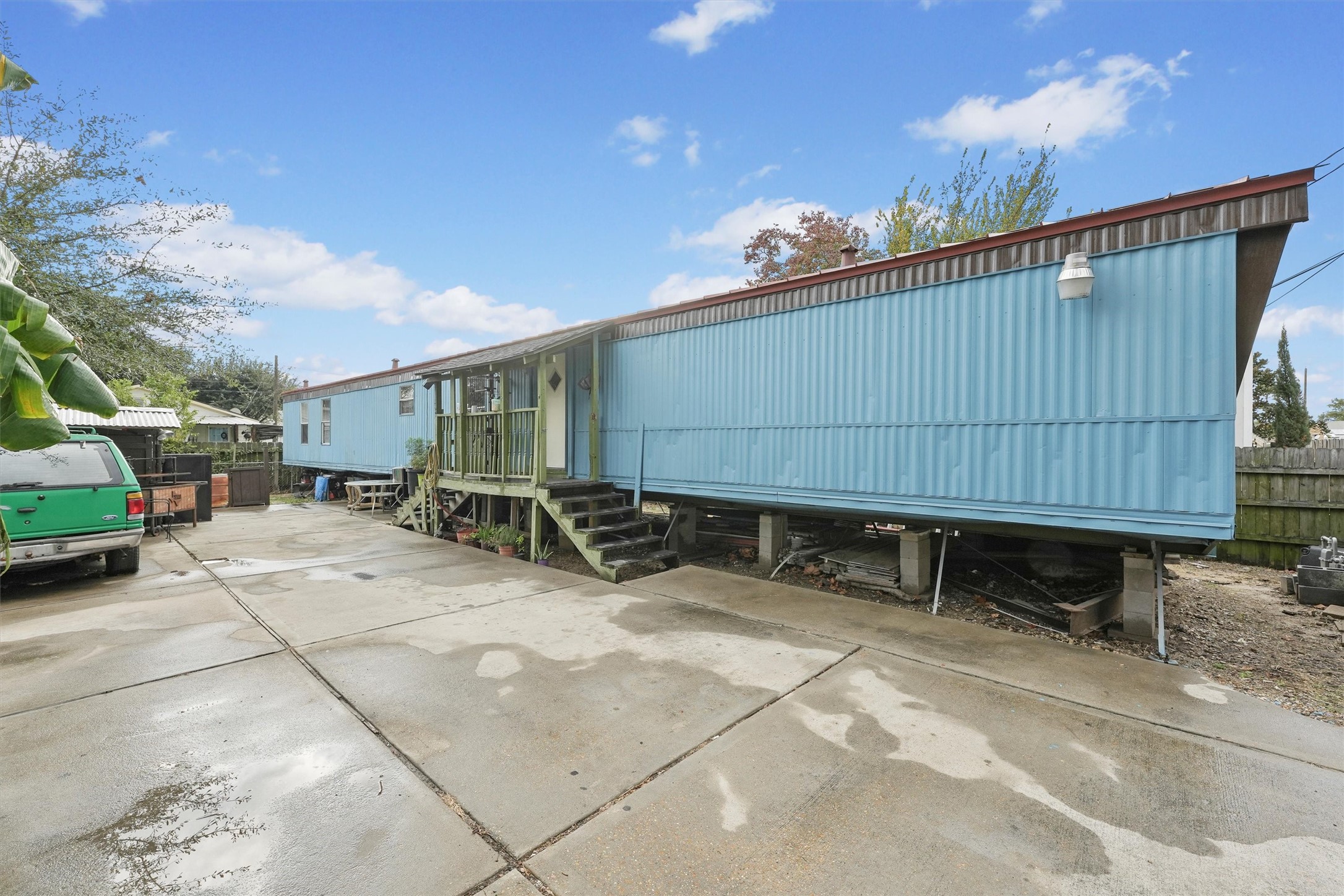 a view of backyard with sitting area