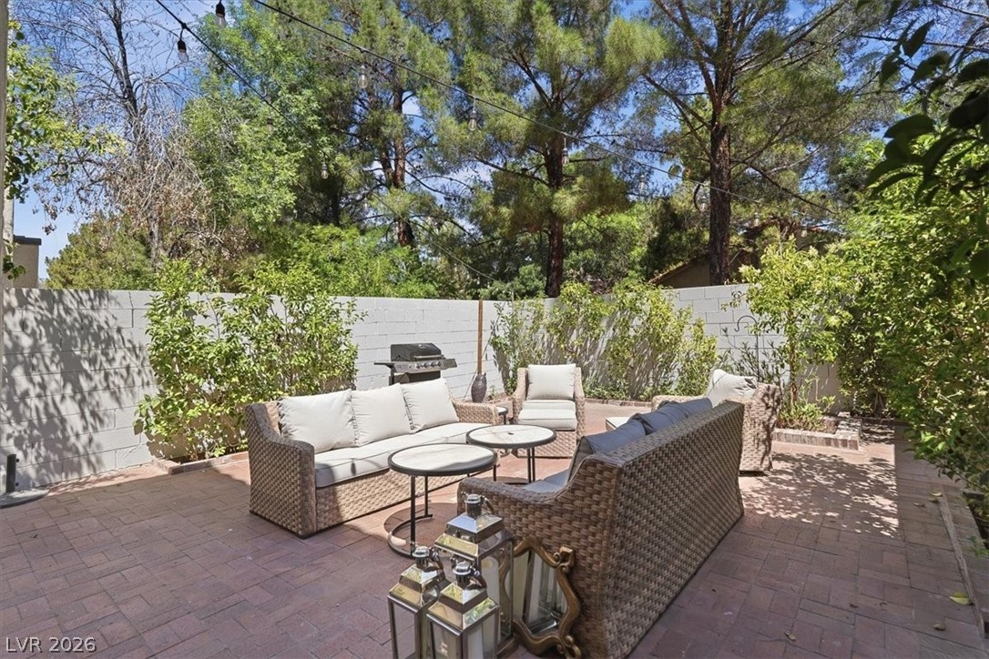 6250 West Flamingo Road, Unit 93 Las Vegas, NV 89103 - Photo 3 of 38 An inviting brick patio provides an ideal setting for outdoor entertaining and relaxation.
