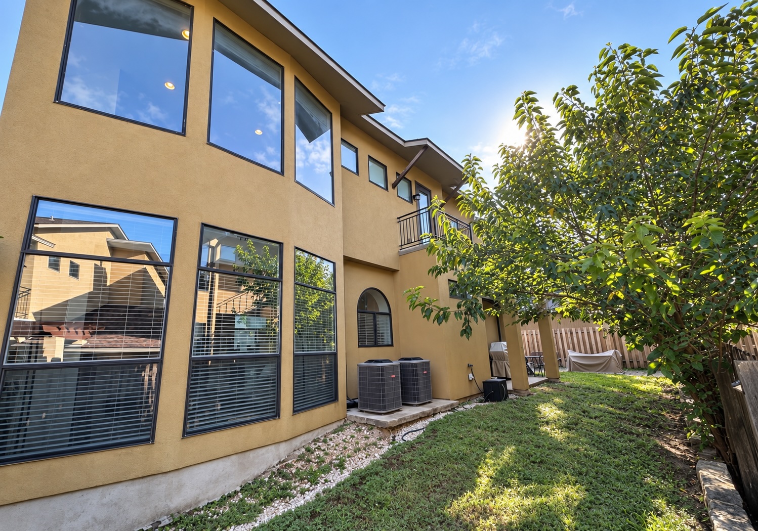 2316 Thornton Road, Unit B Austin, TX 78704 - Photo 24 of 25 Soaring windows and smooth stucco define the exterior of this modern multi-level home.