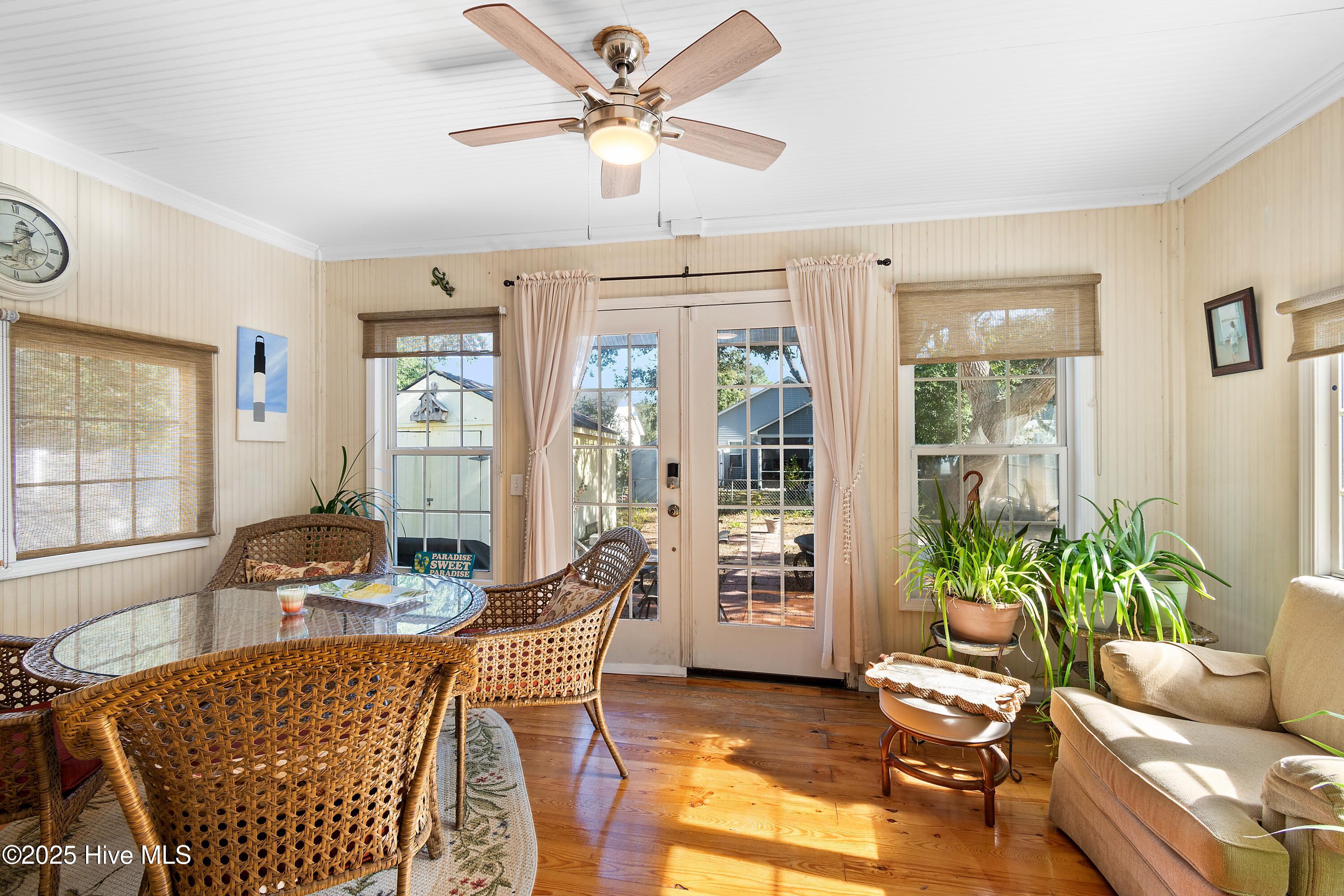 166 Northwest 7th Street Oak Island, NC 28465 - Photo 14 of 39 Sun Porch