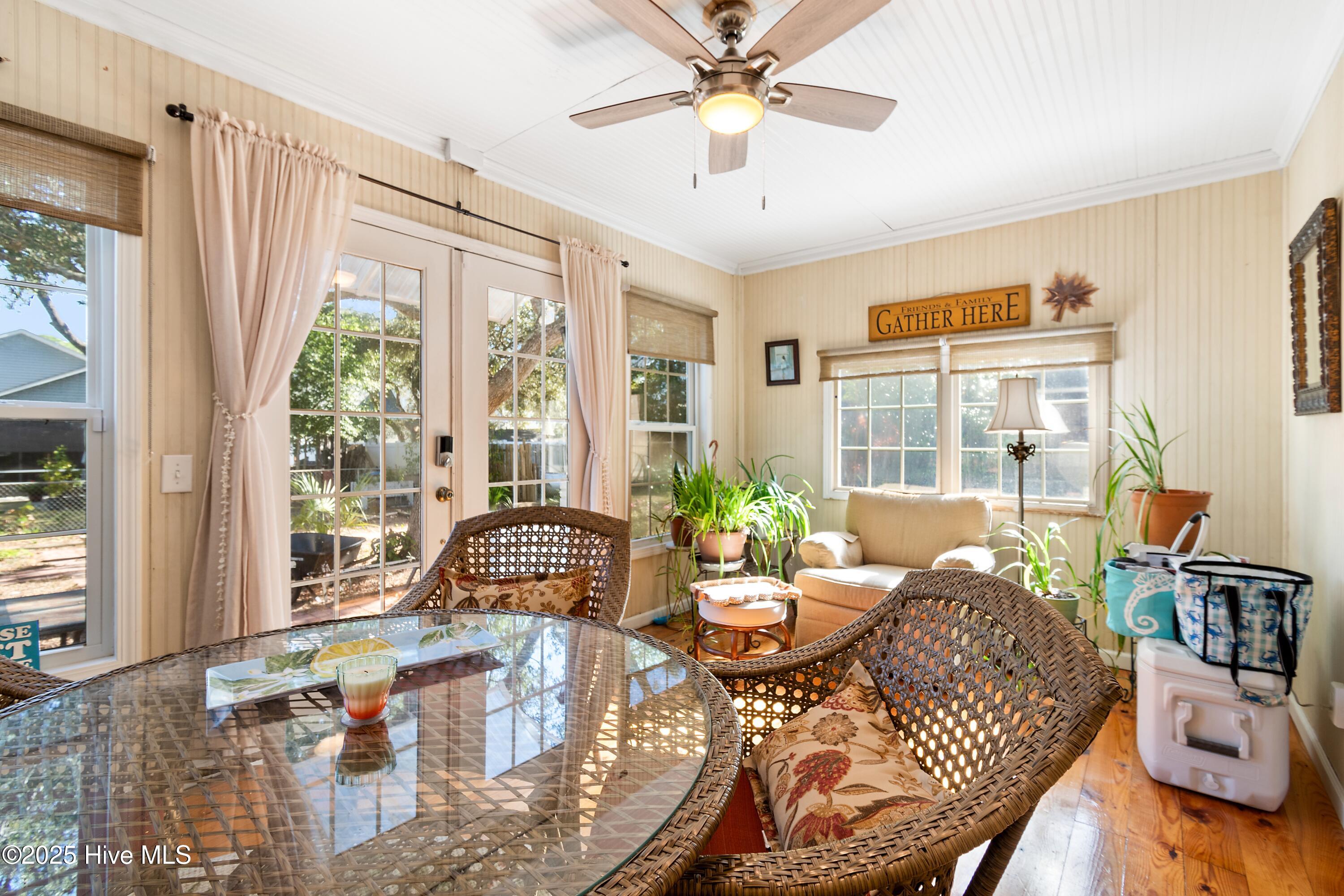 166 Northwest 7th Street Oak Island, NC 28465 - Photo 15 of 39 Sun porch