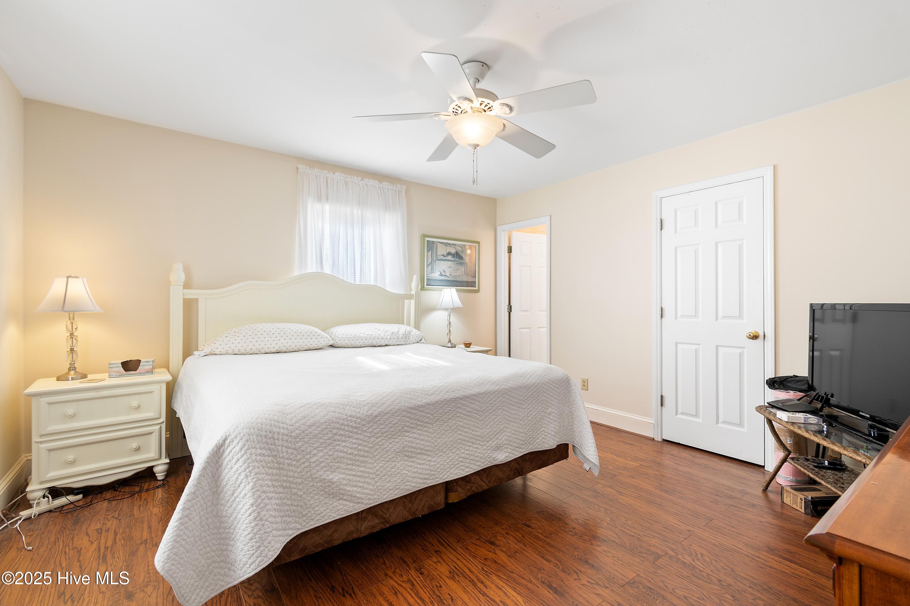 166 Northwest 7th Street Oak Island, NC 28465 - Photo 16 of 39 Master bedroom