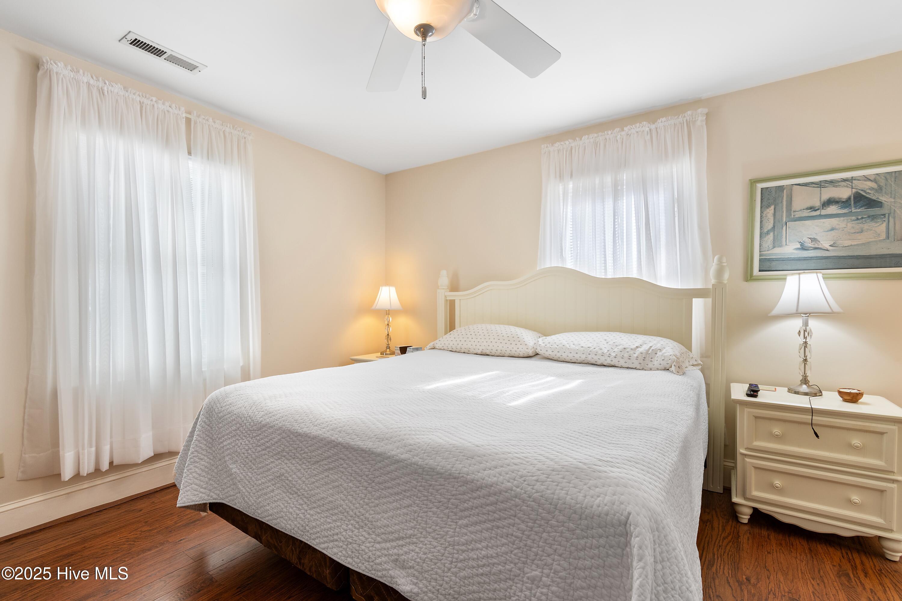 166 Northwest 7th Street Oak Island, NC 28465 - Photo 17 of 39 Master bedroom