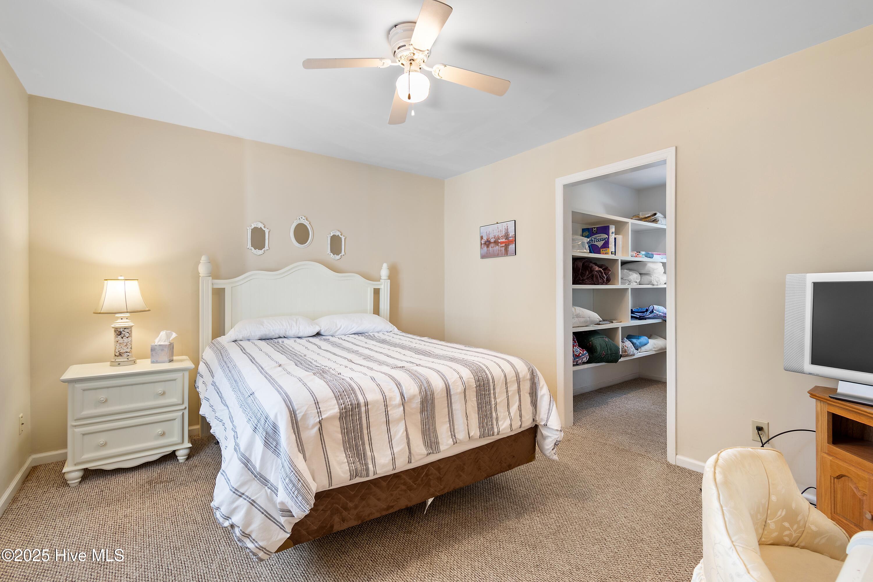 166 Northwest 7th Street Oak Island, NC 28465 - Photo 23 of 39 Upstairs 1st bedroom