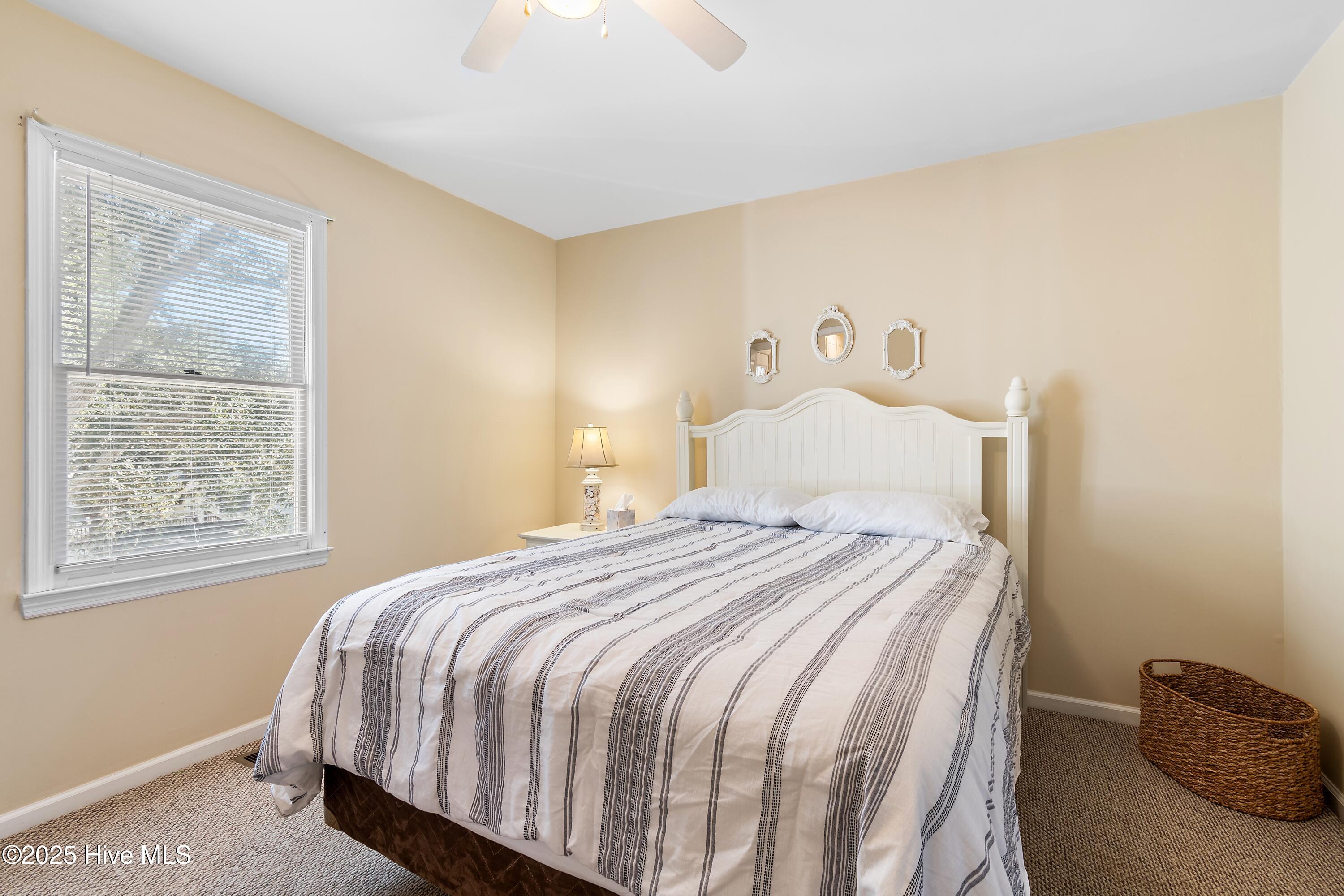 166 Northwest 7th Street Oak Island, NC 28465 - Photo 24 of 39 Upstairs 1st bedroom