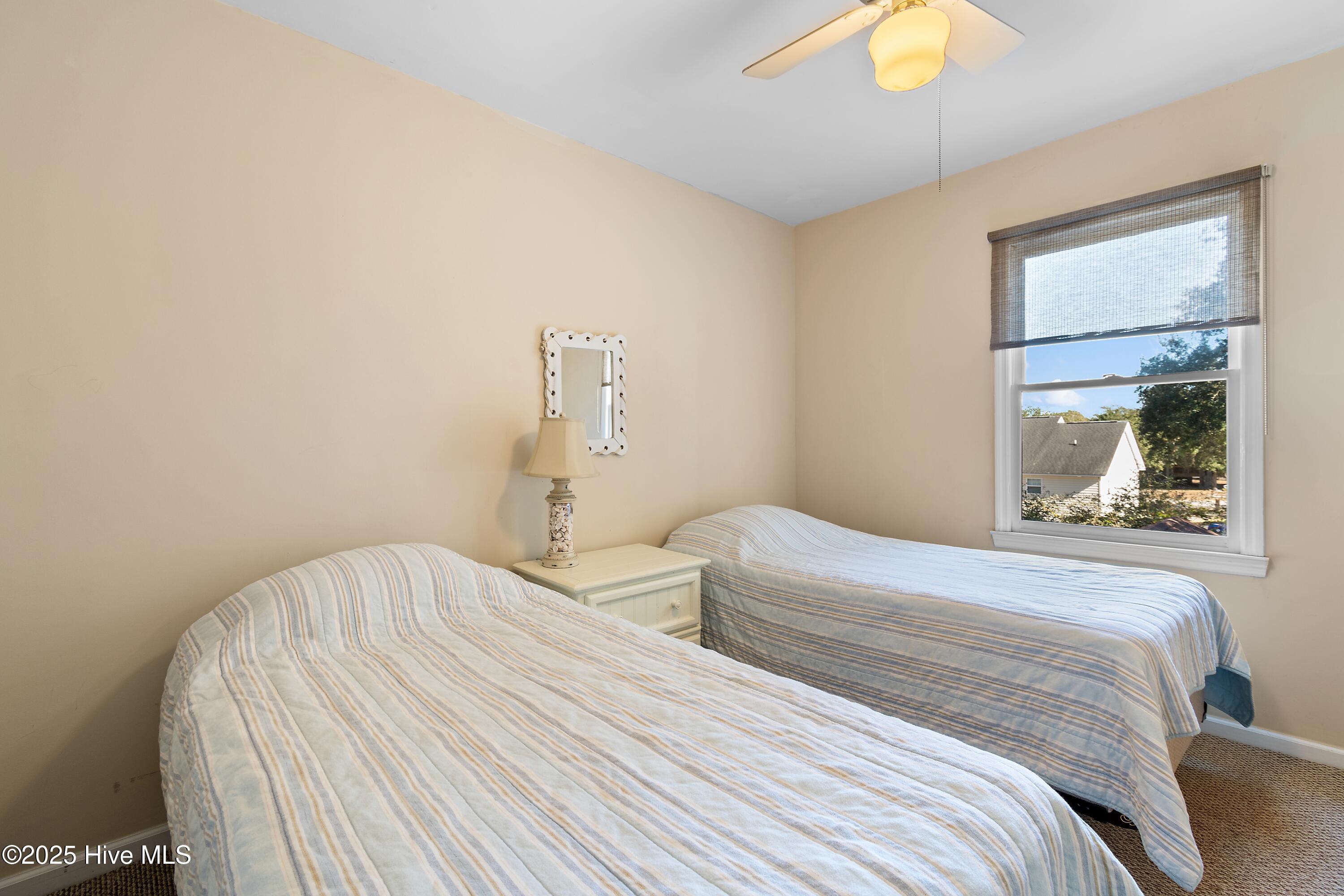 166 Northwest 7th Street Oak Island, NC 28465 - Photo 28 of 39 Upstairs 2nd bedroom
