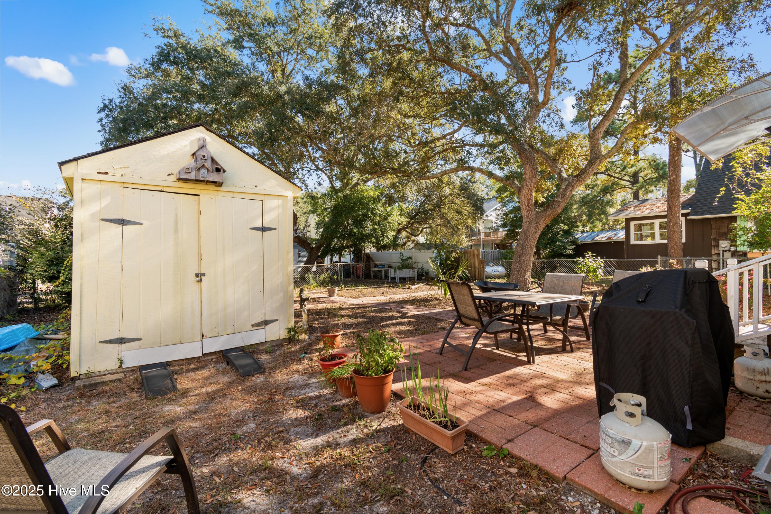 166 Northwest 7th Street Oak Island, NC 28465 - Photo 31 of 39 Storage building