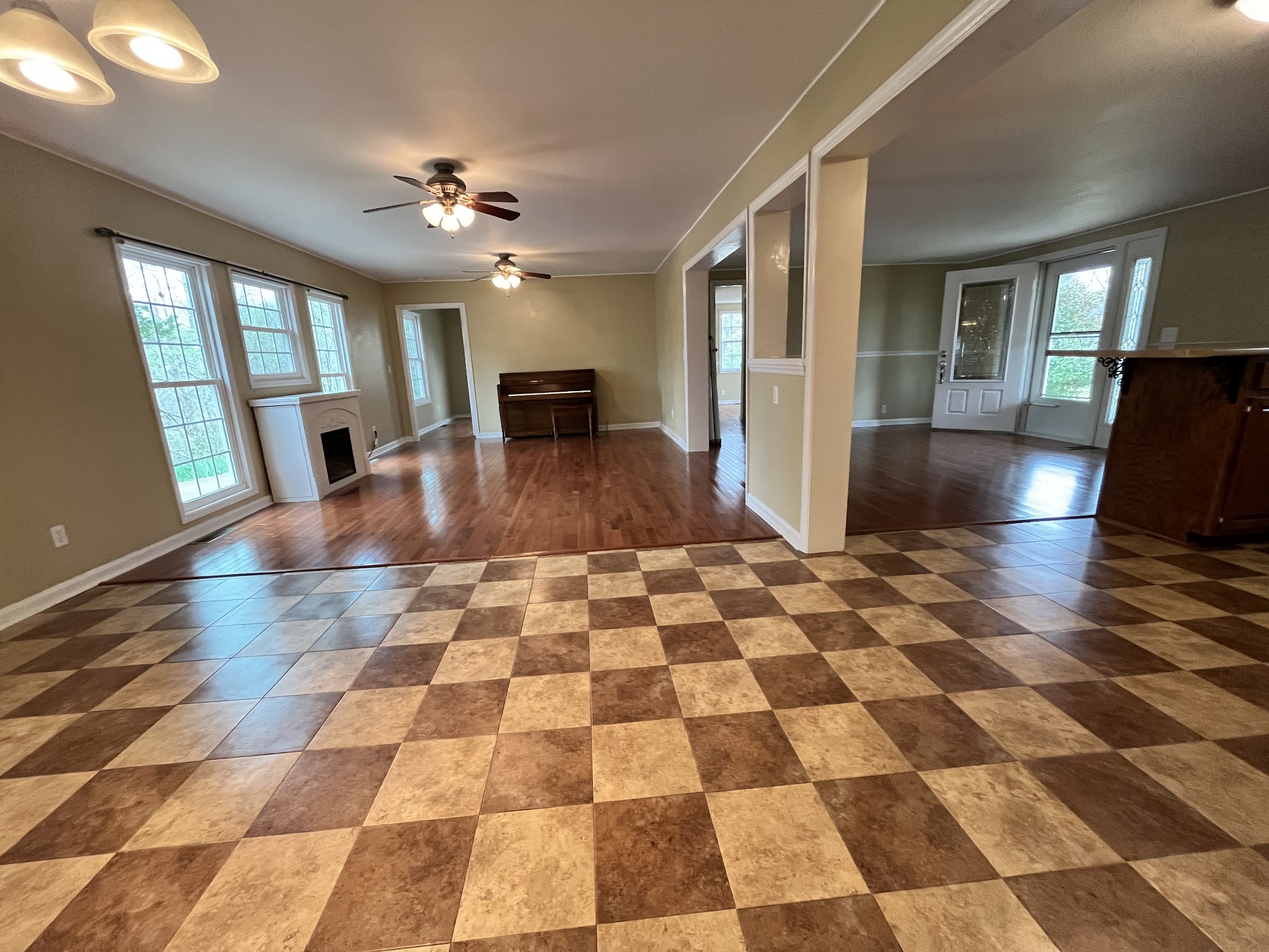 1763 Highway 166 Mount Pleasant, TN 38474 - Photo 19 of 40 a view of a living room with a black white checkered floor