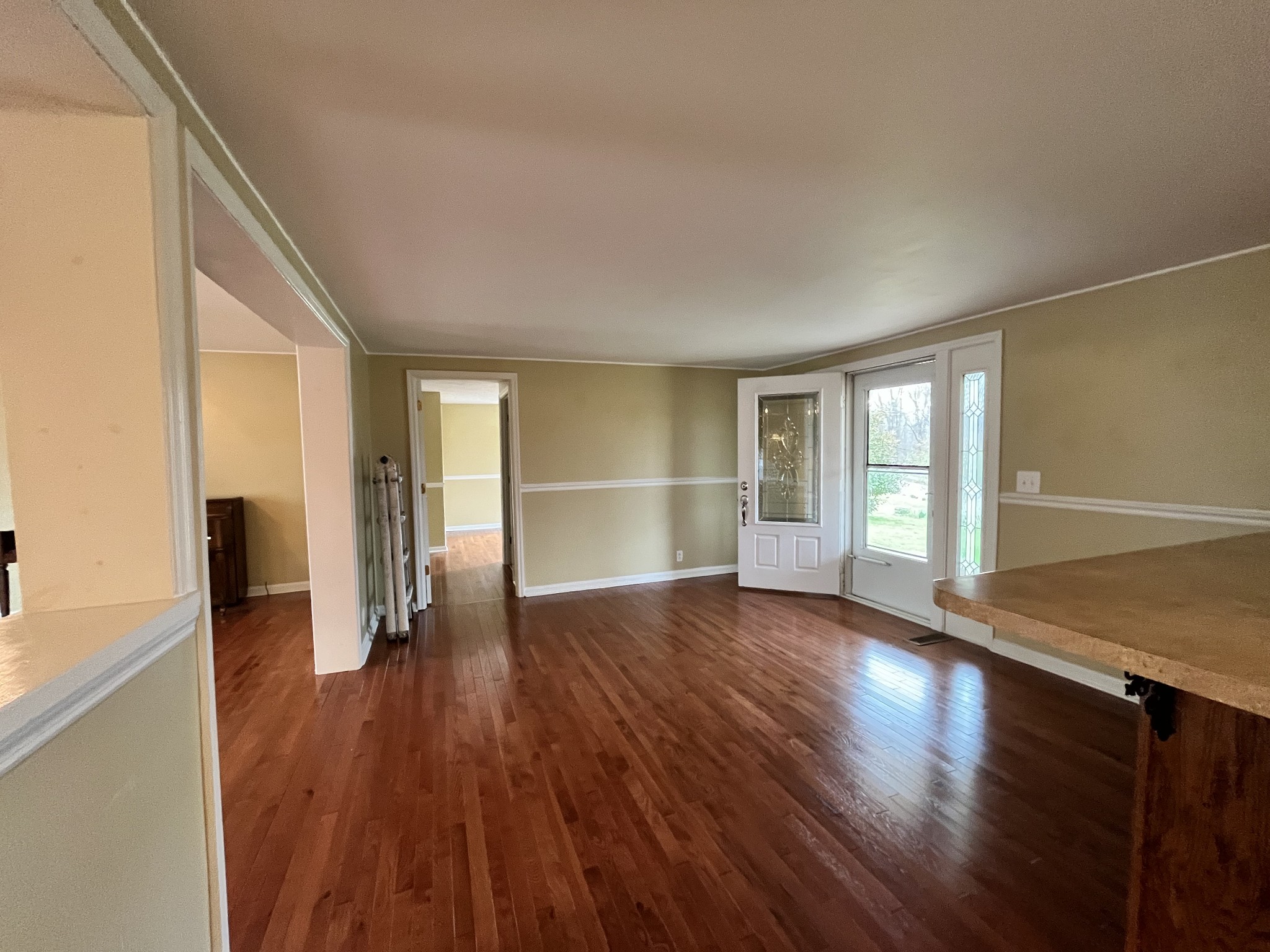 1763 Highway 166 Mount Pleasant, TN 38474 - Photo 21 of 40 a view of wooden floor and windows in an empty room