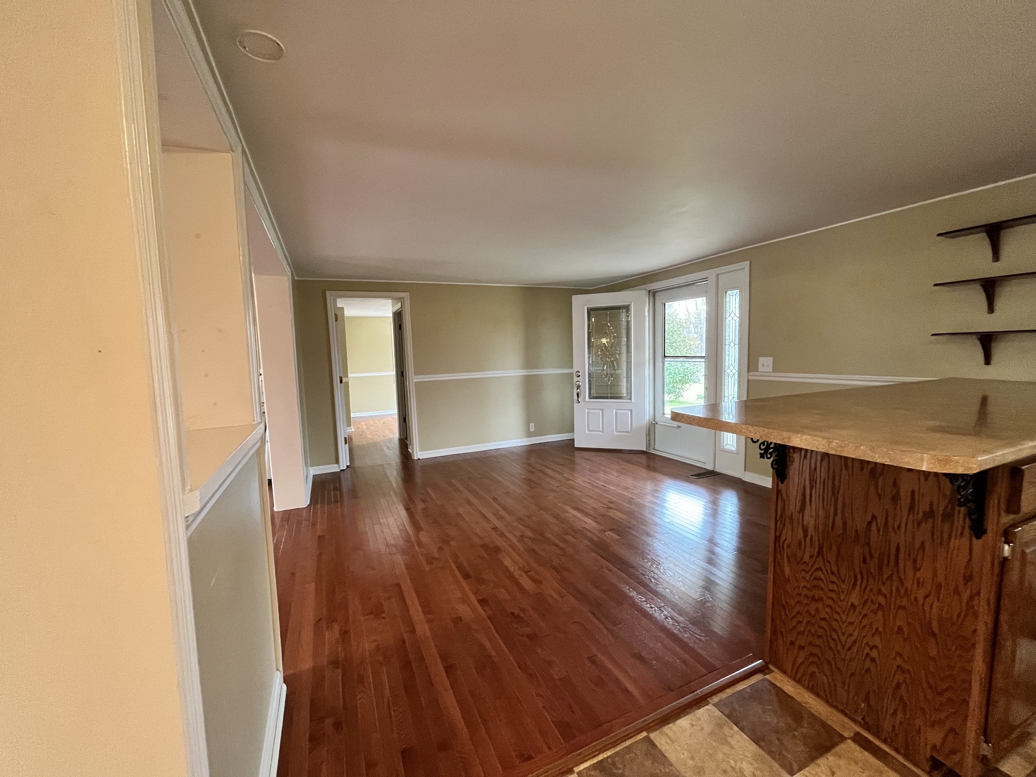 1763 Highway 166 Mount Pleasant, TN 38474 - Photo 24 of 40 wooden floor in an empty room with a window