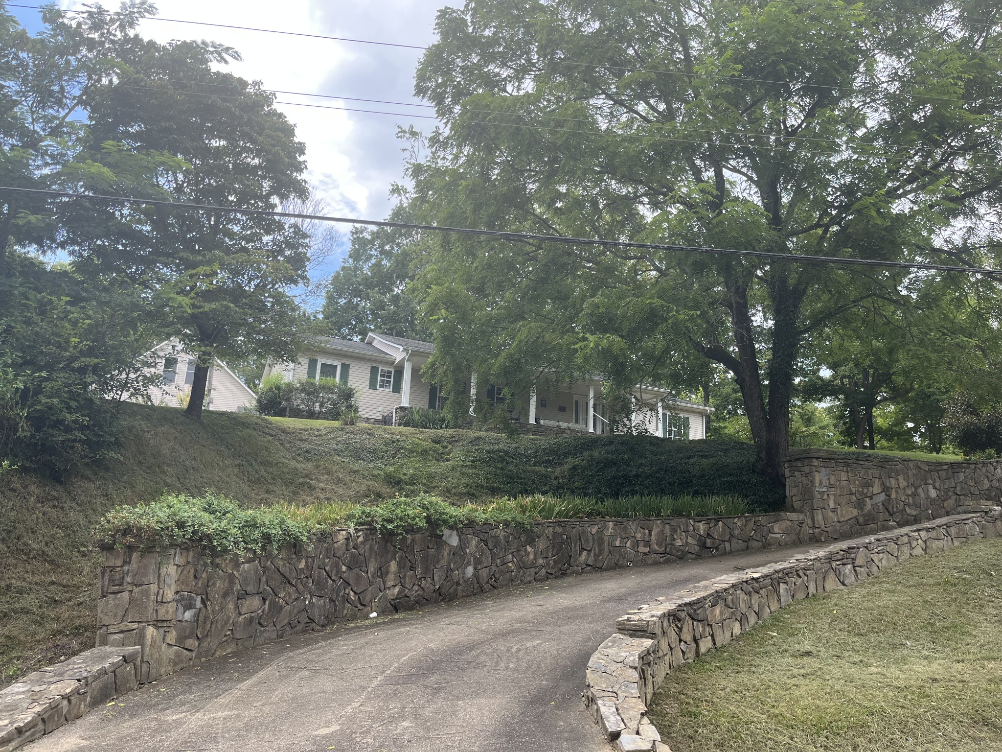 1763 Highway 166 Mount Pleasant, TN 38474 - Photo 8 of 40 a view of a house with a yard