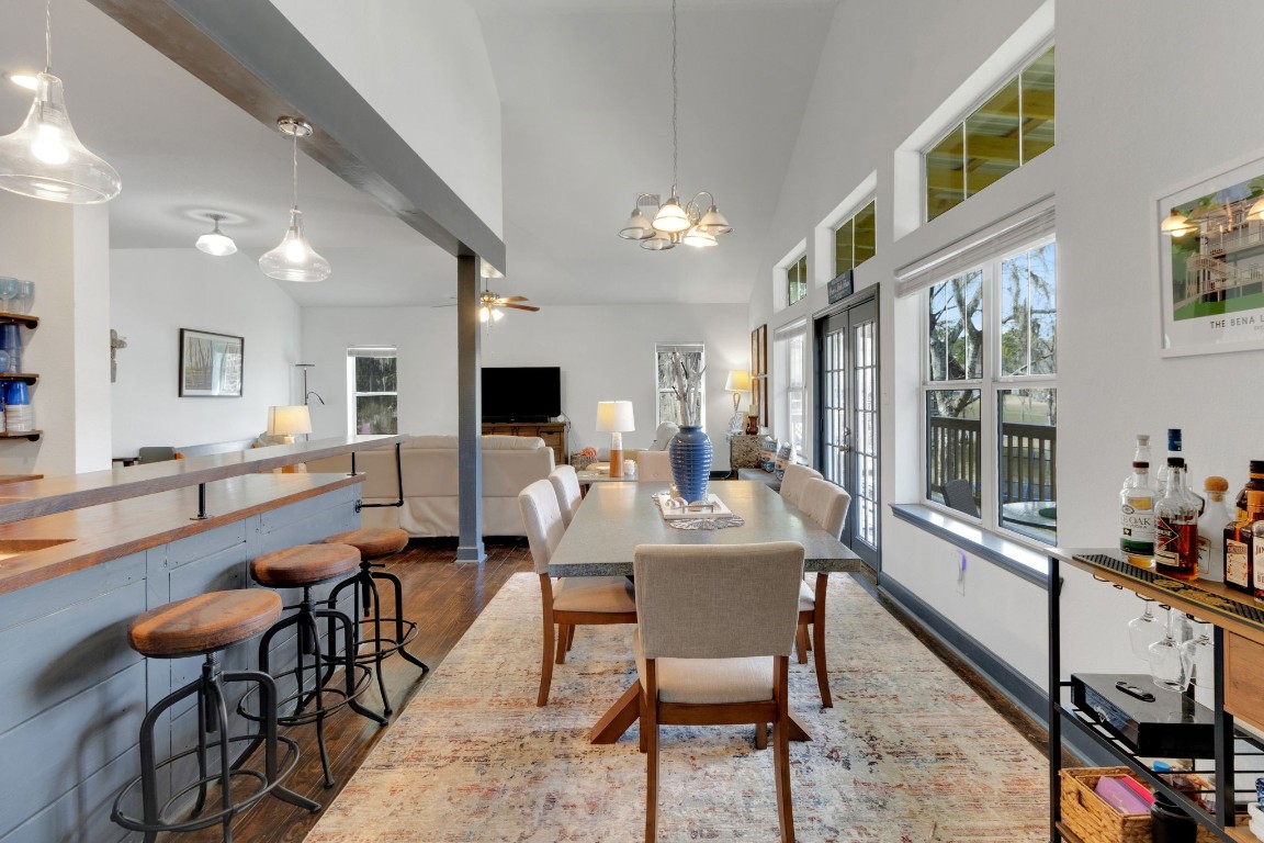 171 Kings Way Coldspring, TX 77331 - Photo 11 of 50 There is a wall of windows along the back of the home and doors that lead to the covered back deck