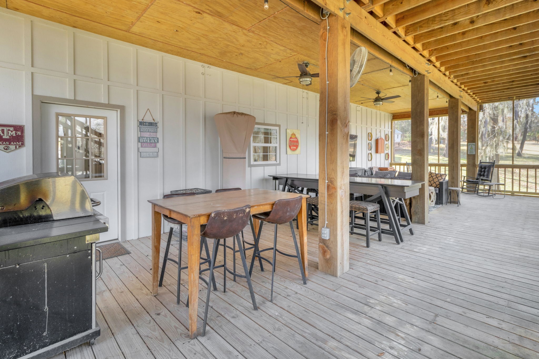 171 Kings Way Coldspring, TX 77331 - Photo 16 of 50 Downstairs is this amazing screened in porch! This can also be accessed from the lower level.