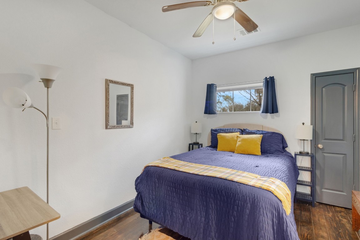 171 Kings Way Coldspring, TX 77331 - Photo 21 of 50 a bedroom with a bed and a dresser