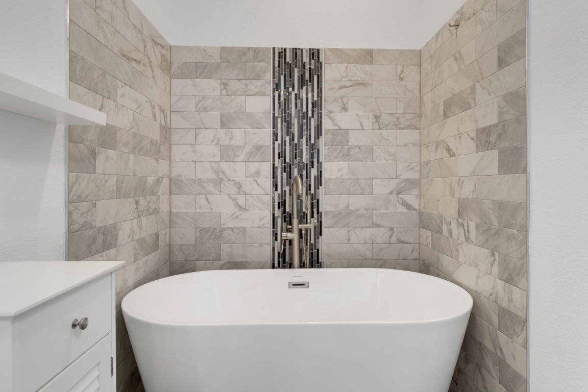 171 Kings Way Coldspring, TX 77331 - Photo 29 of 50 a white bath tub sitting in a bathroom