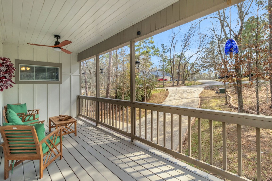 171 Kings Way Coldspring, TX 77331 - Photo 3 of 50 a view of a porch with furniture and wooden floor