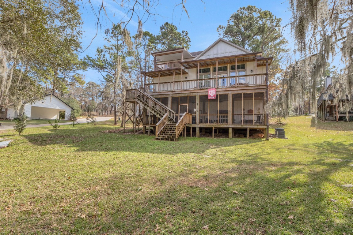 171 Kings Way Coldspring, TX 77331 - Photo 36 of 50 a view of a house with a yard