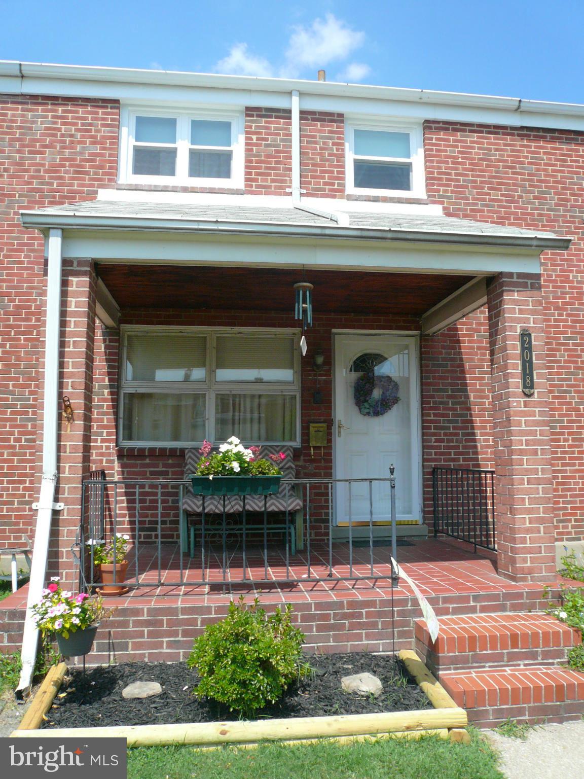 2018 Ormand Road Baltimore, MD 21222 - Photo 1 of 21 a front view of a house with garden
